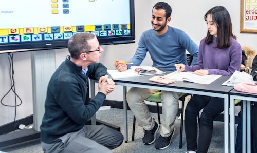 Tutor and students in class